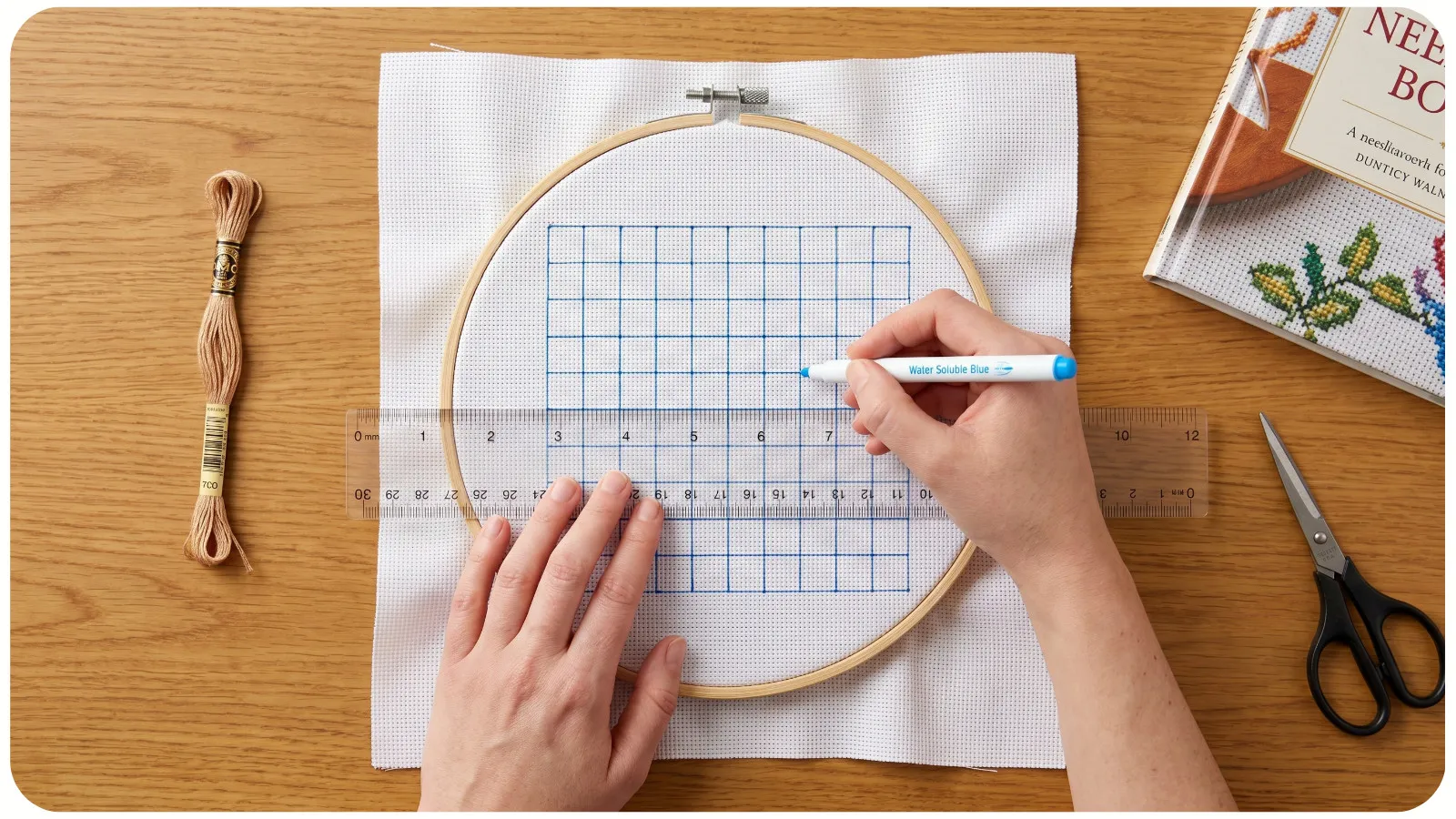 Pre-gridding cross-stitch fabric with a washable marker